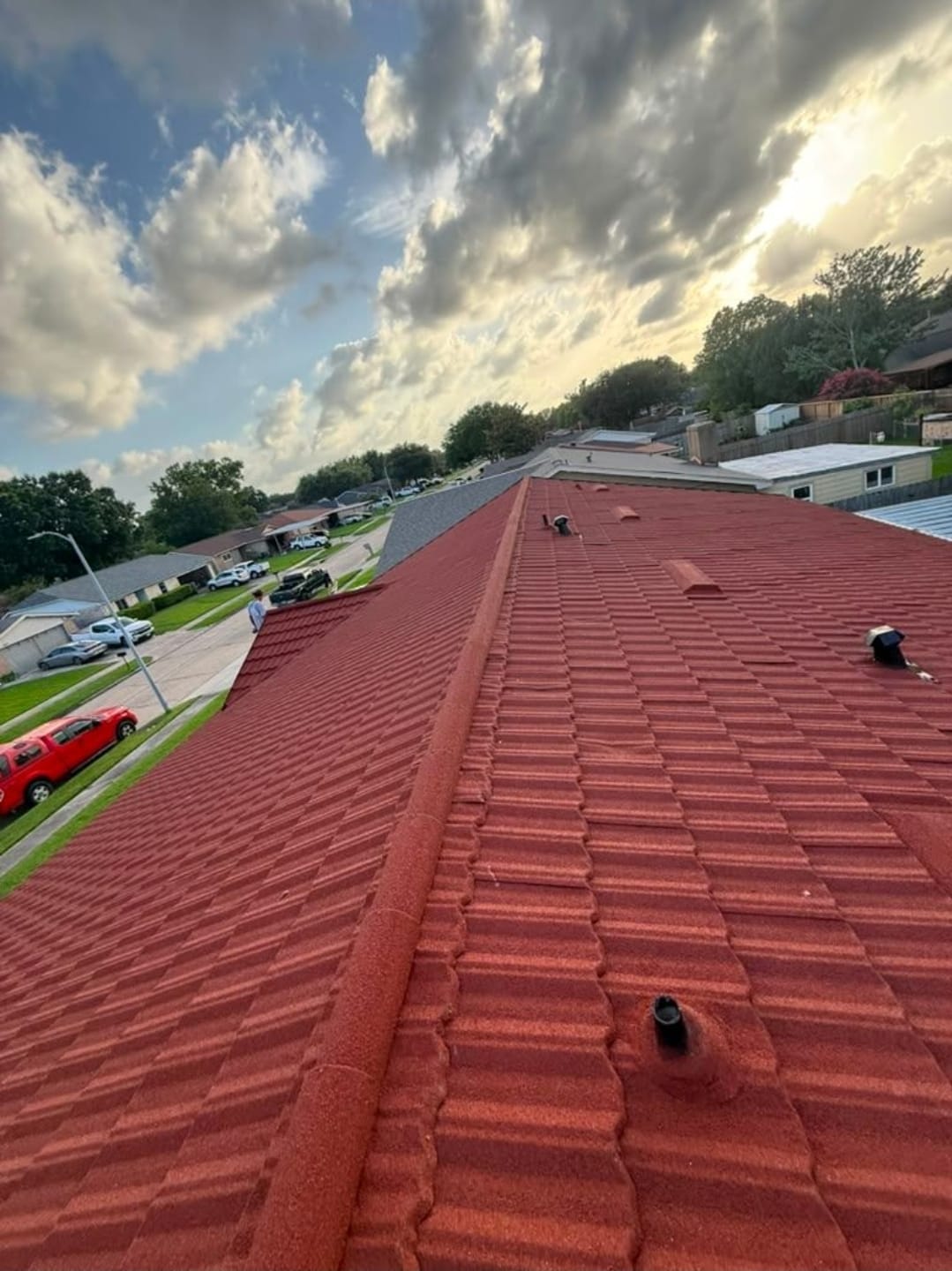 Red Metal Tile Roof — Sunset Detail