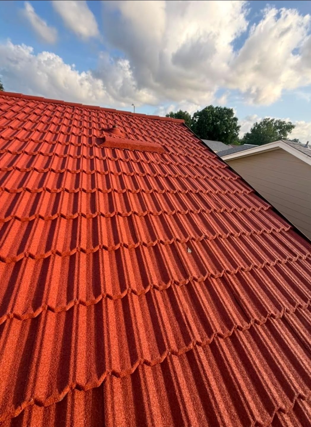 Charcoal Metal Tile Roof — Ridge Detail