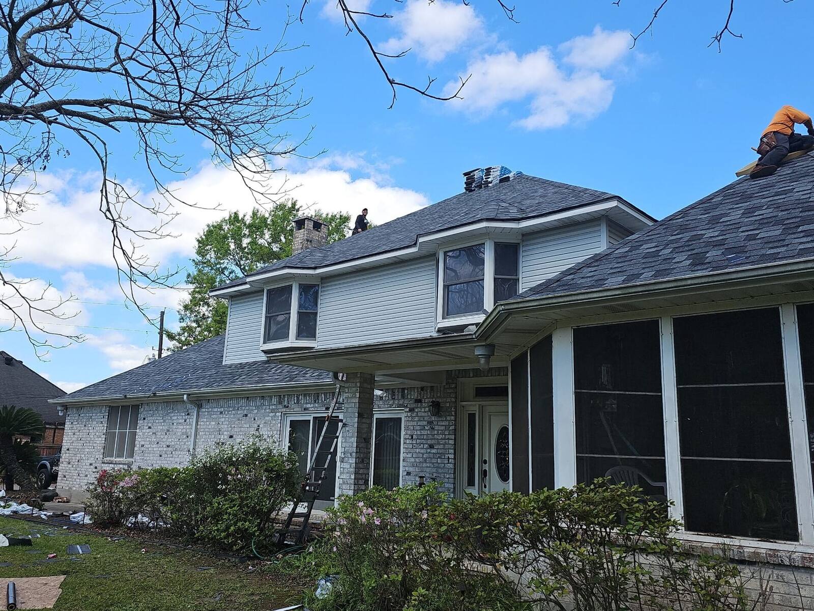 WR Pro roofing crew installing a new roof with precision and care